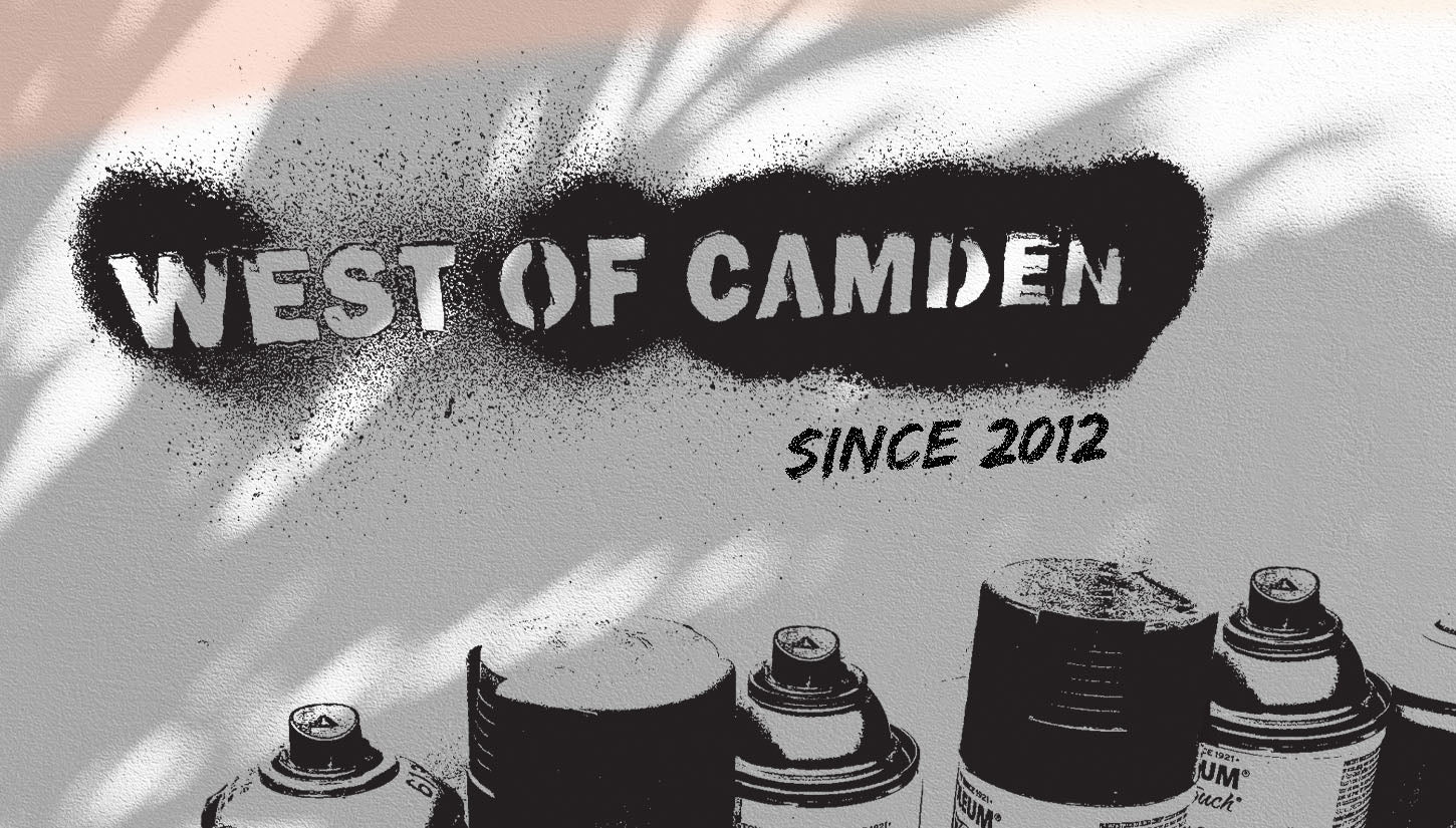 West of Camden Since 2012 spray painted on a wall with several spray cans below
