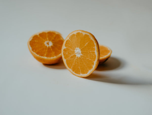 sliced oranges on a kitchen counter 
