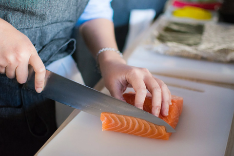 Women slicing salmon