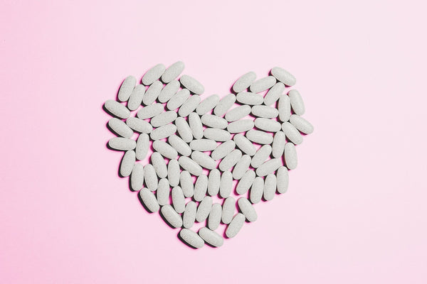  Heart shaped collection of white pills