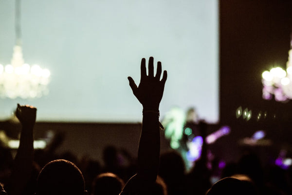 raising hand to ask a question 