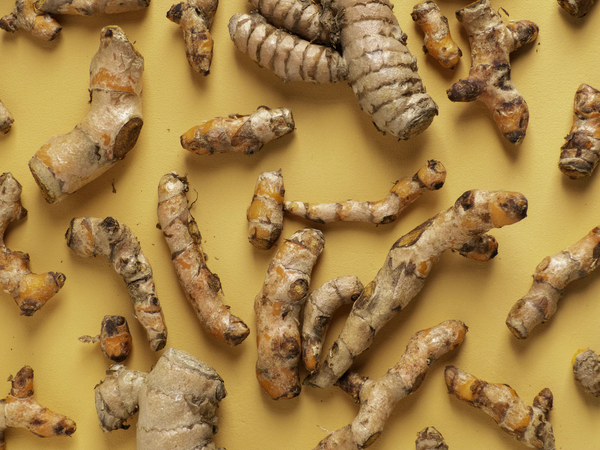 Several pieces of turmeric root.