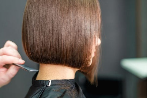 Woman Getting Hair Cut At Salon - Cutting Hair Shorter To Help With Hair Loss Shock