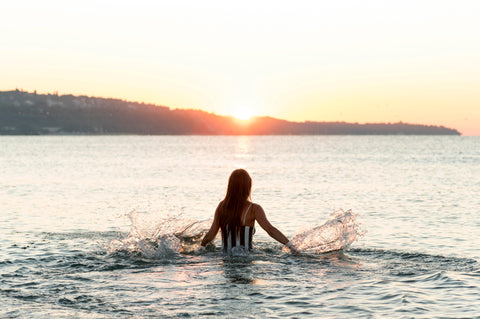 wide-shot-of-beautiful-girl-at-the-beach