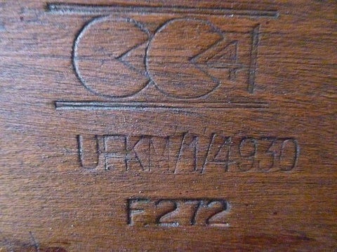 CC41 mark on bookcase Wiki Commons image