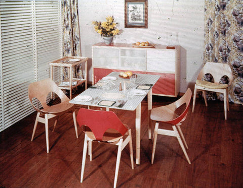 Dining room with furniture by Kandya Ltd., c. 1952. Includes sideboard, table and ’Jason’ stacking chairs with moulded plywood seats and back rests (designed by Carl Jacobs). Credit: VADS and The Design Council Slide Collection at Manchester Metropolitan University Special Collections.