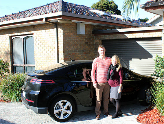 Tenants Jaron and Caz with their Holden Volt electric car