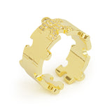 Gold-plated puzzle ring from Re-Do Bricks, symbolizing the interconnectedness and unwavering support within the autism community. A beautiful reminder of love and solidarity for those touched by autism.