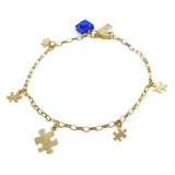 Delicate gold-filled bracelet adorned with autism awareness symbols, representing support and solidarity with the autism community.