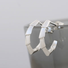 small hoop earrings with sharp lines