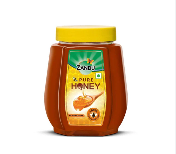 zandu pure honey in a bottle
