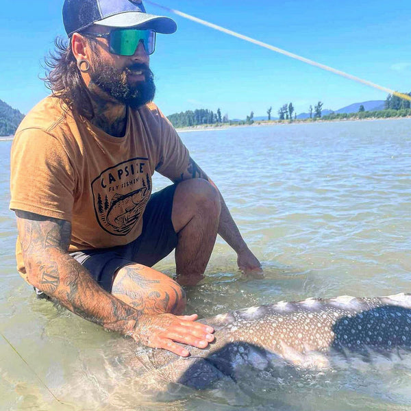 man and sturgeon