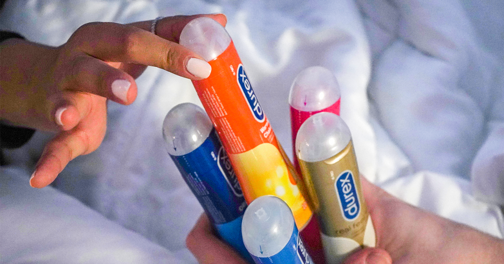 Collection of Durex lubes being chosen from someone’s hand.