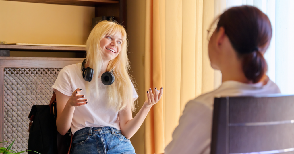 Girl practising the sex talk with her friend.