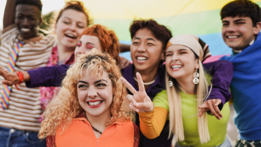 LGBTQIA+ youth posing together for a photo.