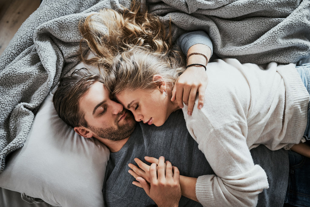 A couple sleeping together post sex helps build a strong relationship.