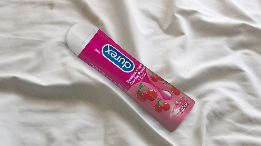 Packaged Durex Passion Cherry Lubricant on a white sheet.
