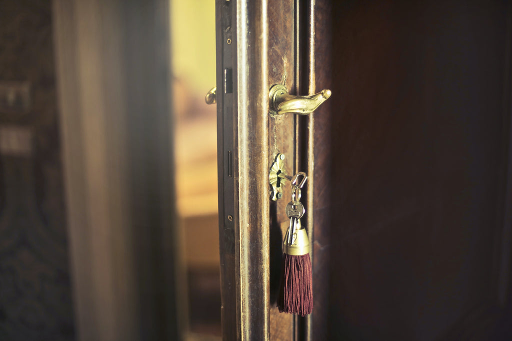 A key is left in the door to an apartment unit.