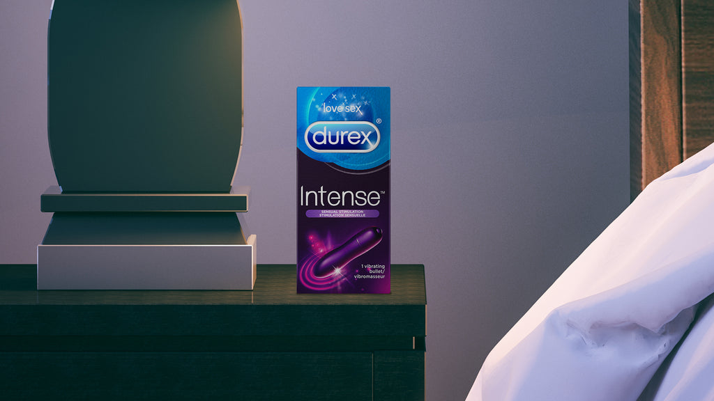 Packaged Durex Insense Sexual Stimulation Vibrating Bullet sitting on a nightstand.
