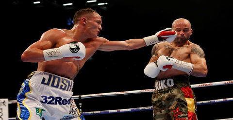 Josh Warrington in action against Kiko Martinez in their first bout at First Direct Arena, Leeds. (May 2017)