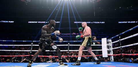 Fury outboxes Wilder in the first fight but fail to claim the victory