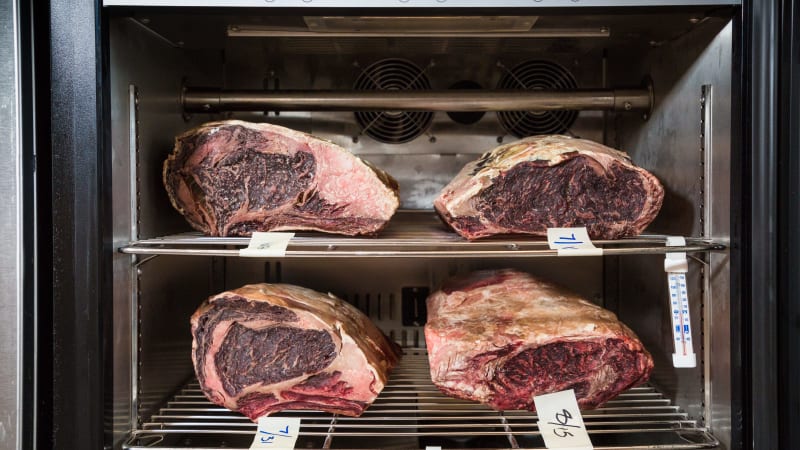 Image credit to Cook's Illustrated Blog, featuring Steak Locker and prime ribs aging in a refrigerator bought for dry aging