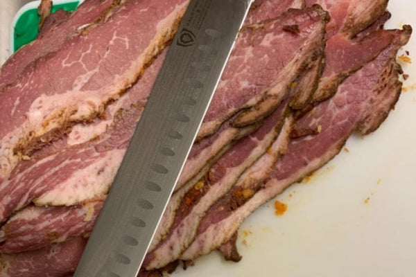 slicing brisket with Dalstrong Kitchen Slicing And Carving Knife