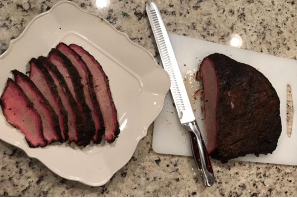 slicing brisket with Hammer Stahl 10-Inch Carving Knife