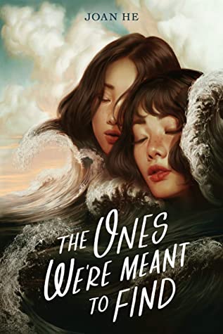 An illustrated book cover featuring two girls, with the title "The Ones We're Meant to Find" by Joan He