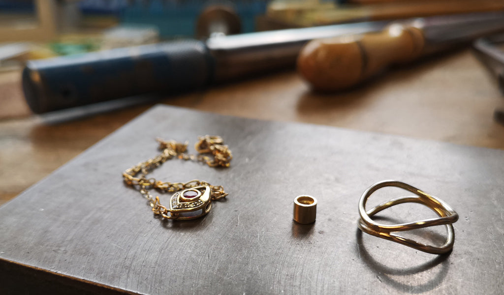 Re-setting a ruby from a customer's jewellery into one of our stacking rings