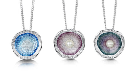 Coloured enamel on silver lunar pendants