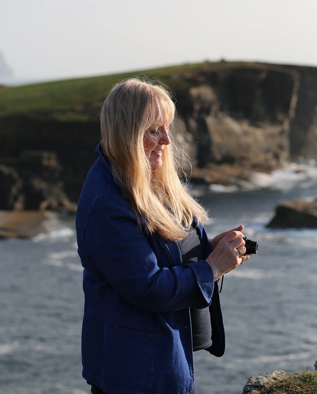 Sheila capturing the scenery at Yesnaby