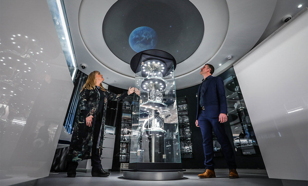 Sheila Fleet and son, Martin, with the gallery's planetarium