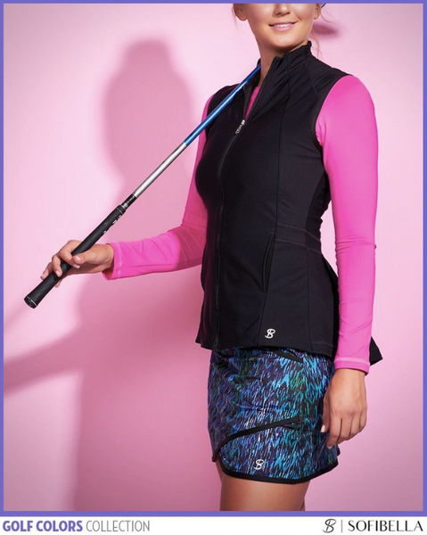 Woman wearing golf apparel by Sofibella