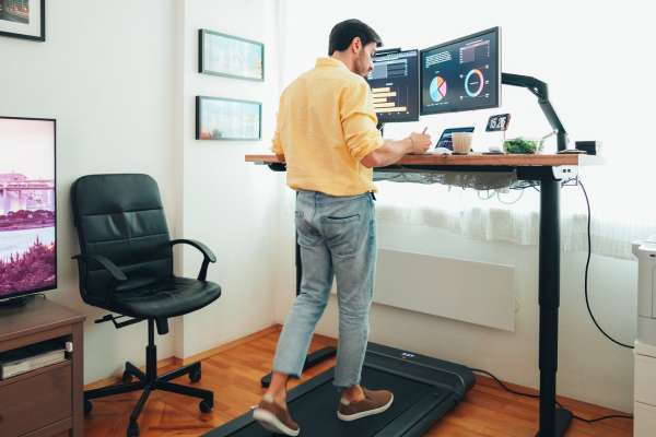 under desk treadmill in use