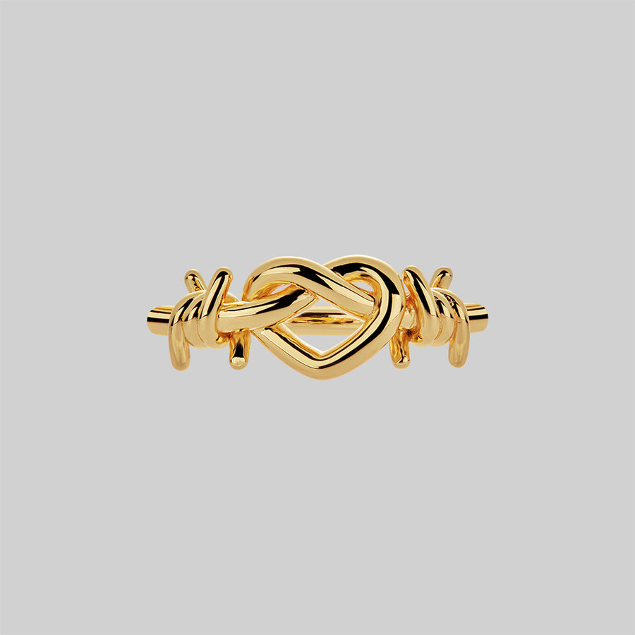 gold heart knot ring