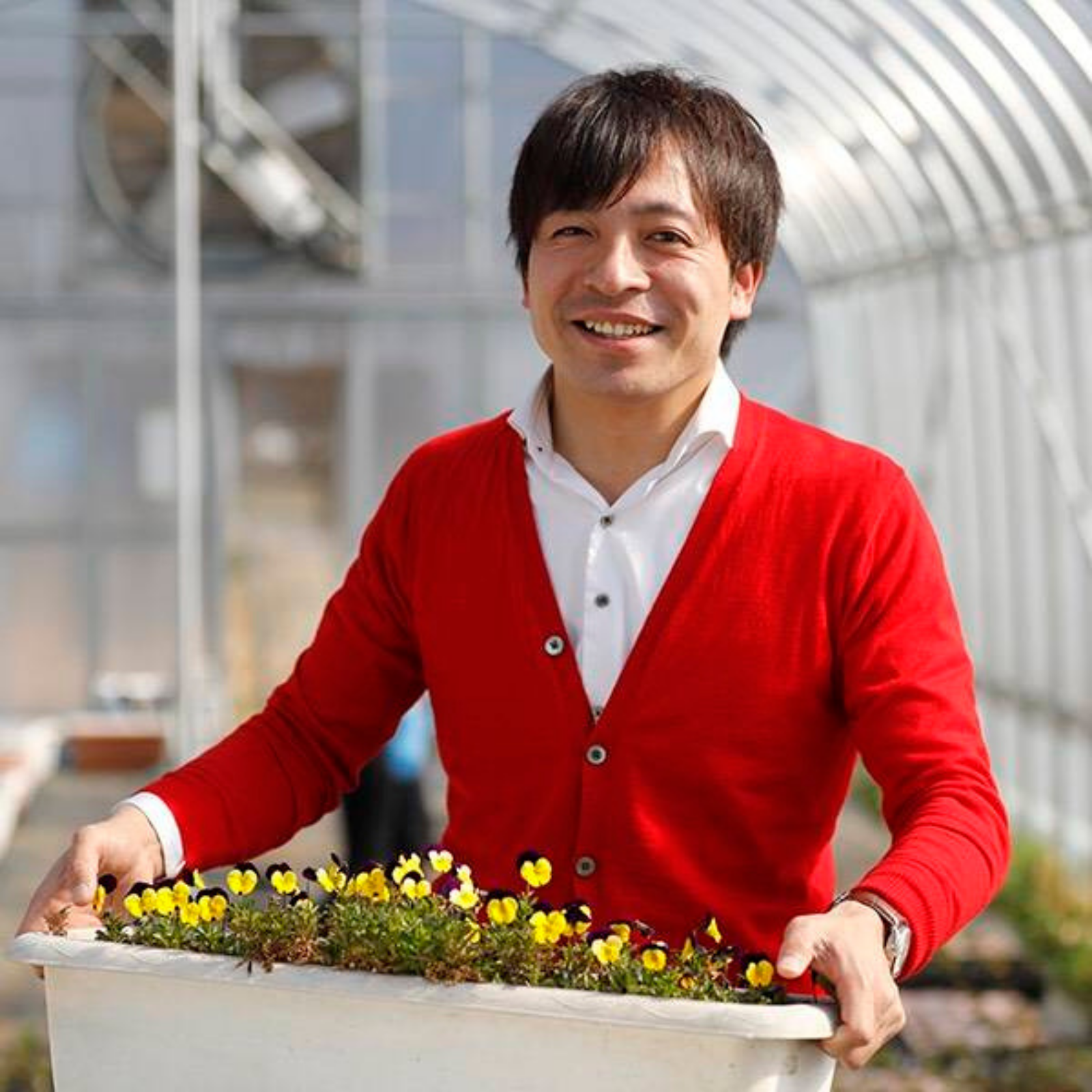 Man holding a edible flower planter