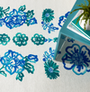 Dash & Albert Graphic Gerbera Teal Machine Washable Rug