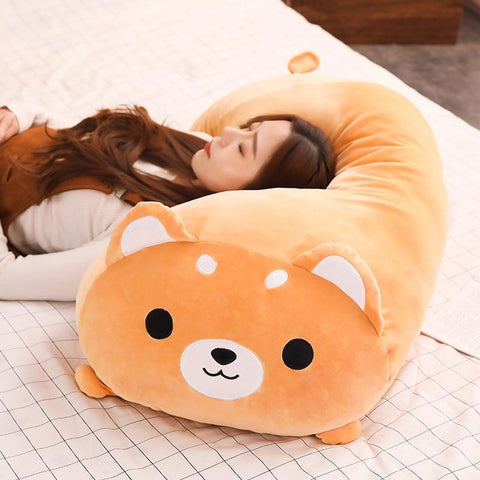 woman laying head on a shiba japanese pillow