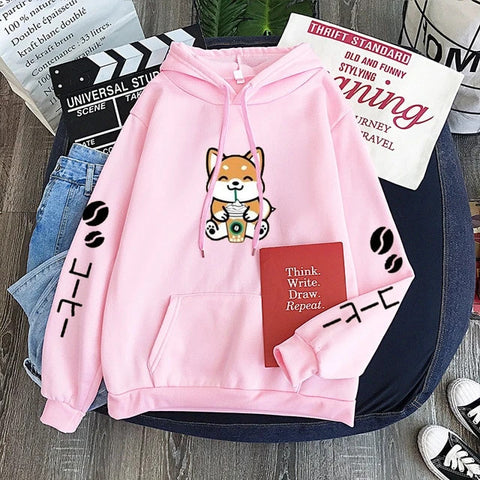 A shiba fleece like hoodie made in pink with a shiba on the front