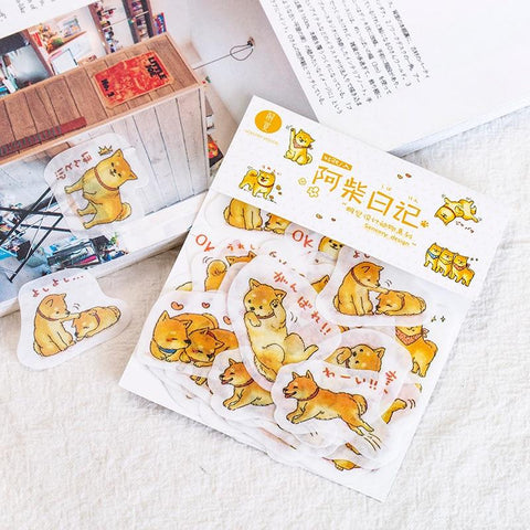 A set of stickers in the shape of shibas in a pack