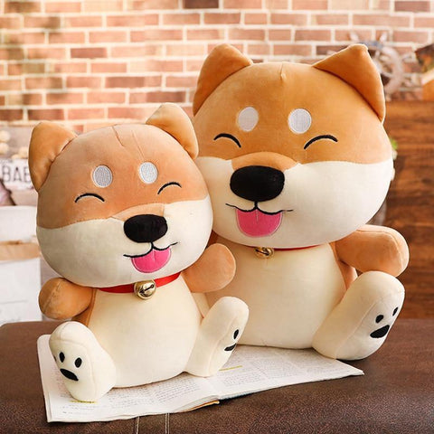 2 shiba sitting side by side that are cartoon plushies