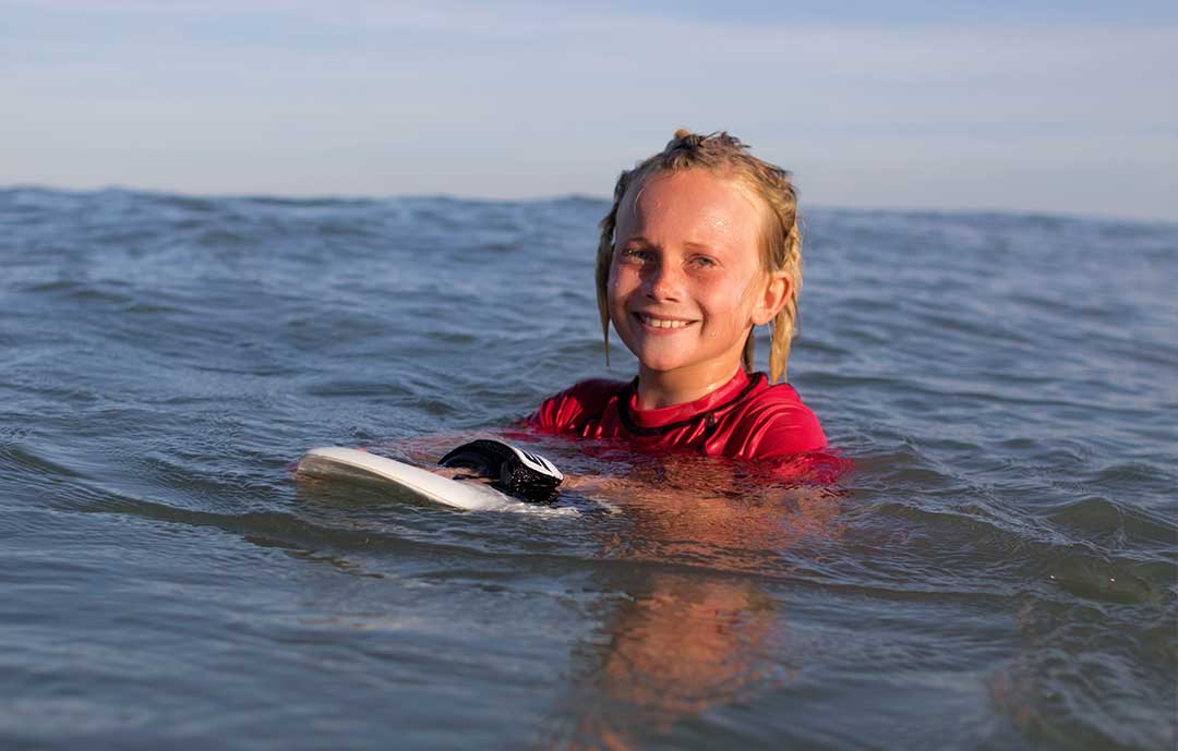 How Is Surfing Good For Student's Mental Health Man Bodysurfing and handboarding Slyde In Florida 