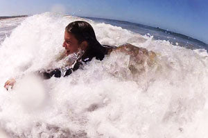 learning how to bodysurf and handplane with an handboard