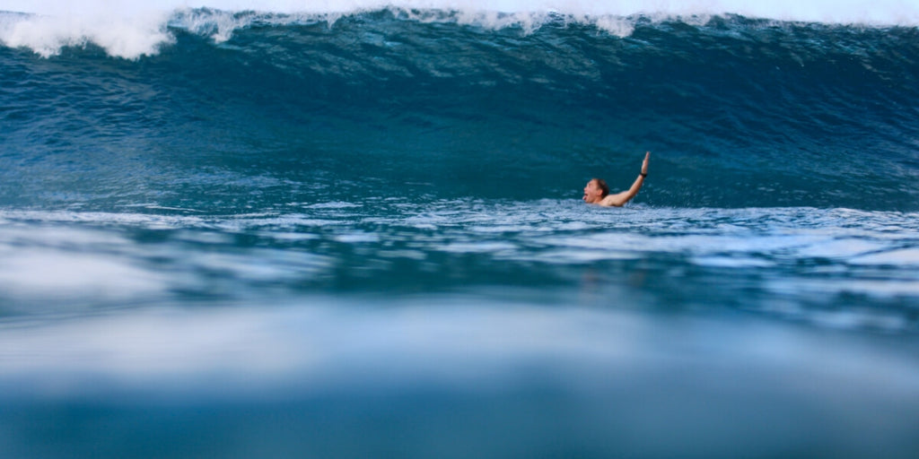 Bodysurfer at Pipeline Oahu Hawaii