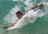 President Obama bodysurfing.