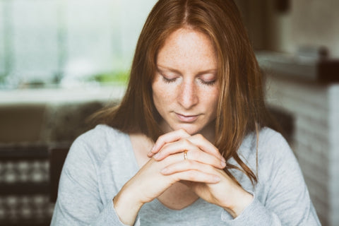 a woman praying