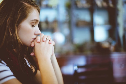 woman praying to god