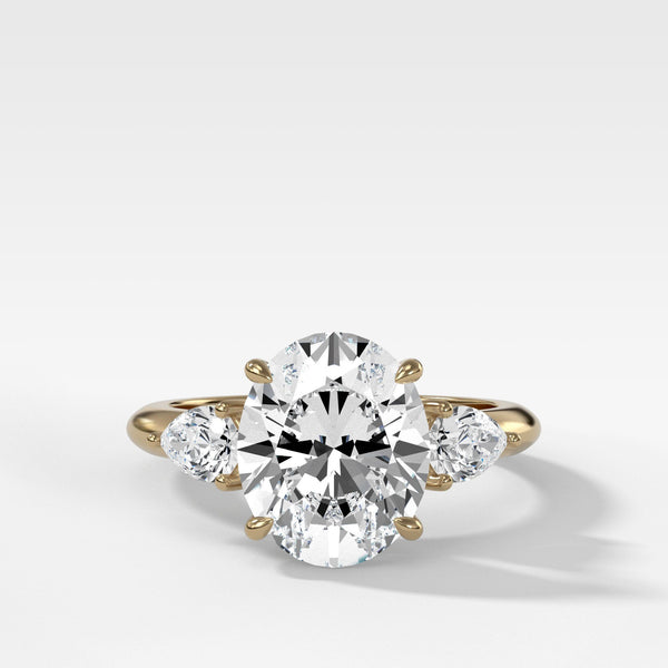 Three Stone Engagement Ring With Pear Side Stones and Oval Cut - Good ...