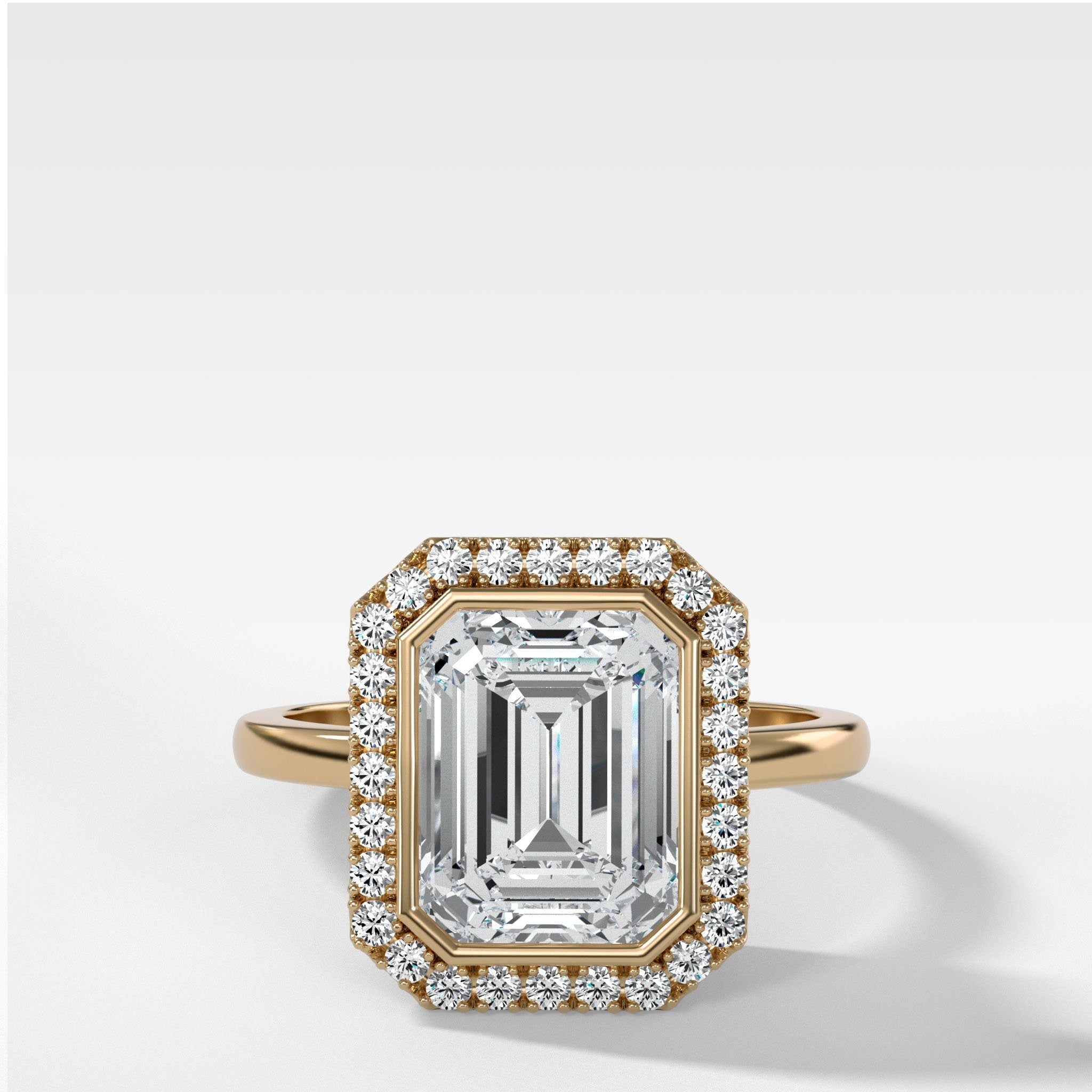 Bezel set emerald cut on sale diamond